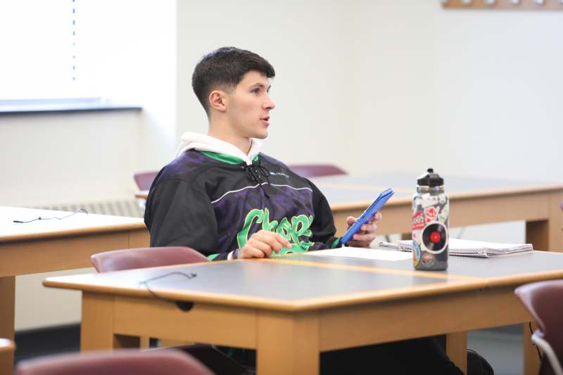 a man sitting at a desk