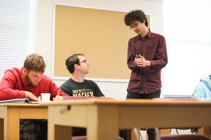 a man standing in front of a group of people