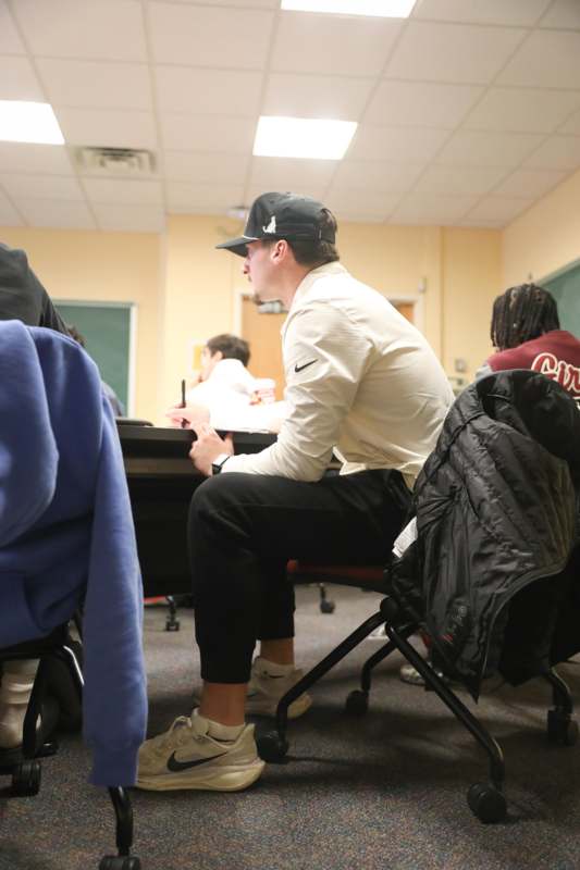 a man sitting at a desk