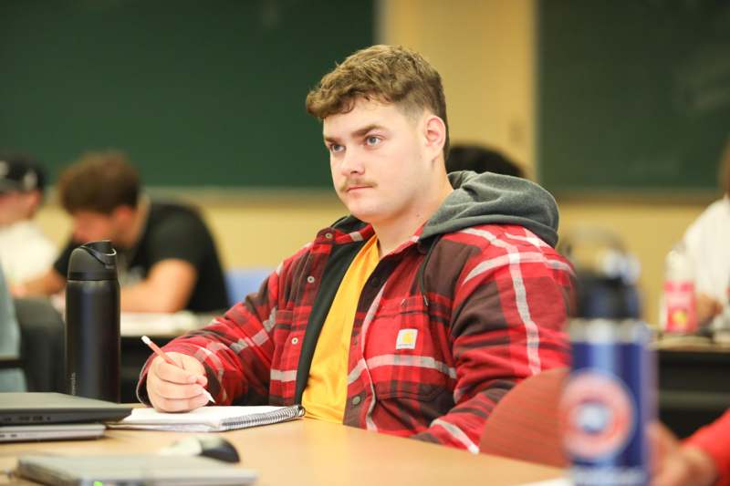 a man sitting at a desk