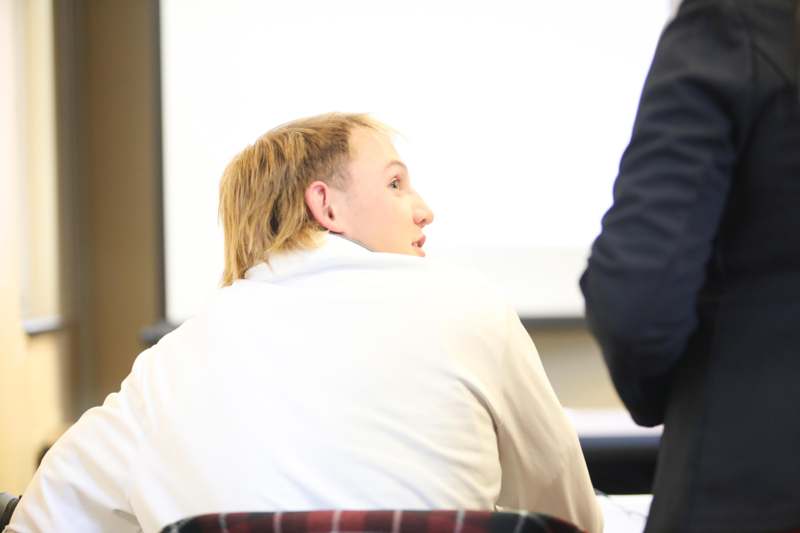 a person sitting in a chair