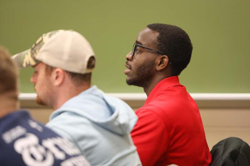 a man in a red shirt