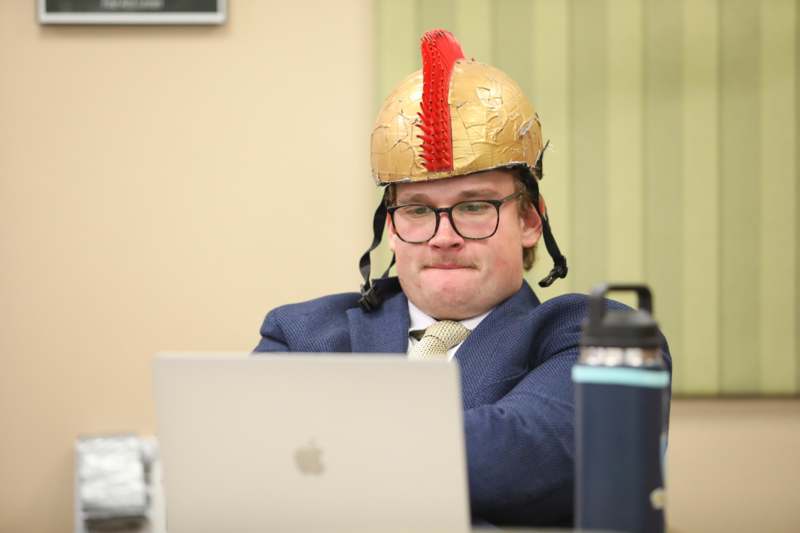 a man wearing a helmet and glasses