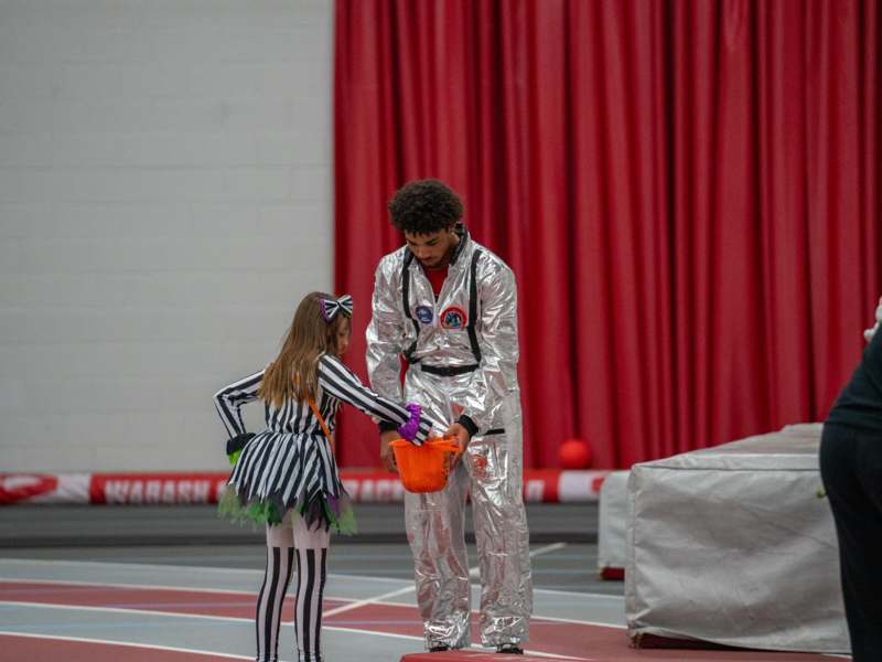 a man and a girl in clothing