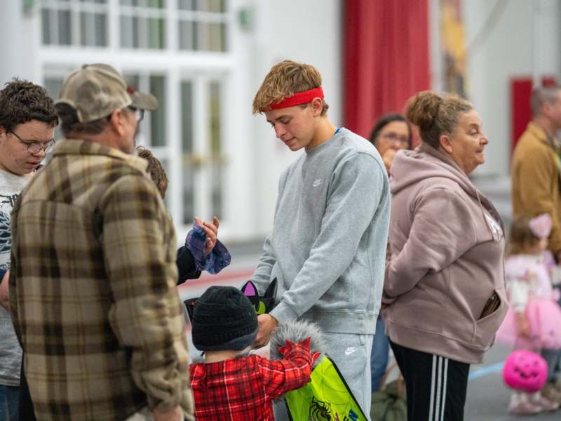 a group of people standing in a line