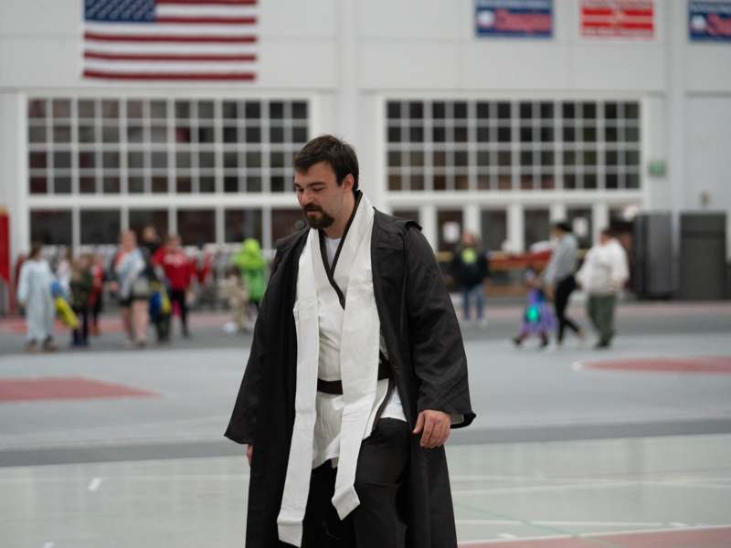 a man in a black robe