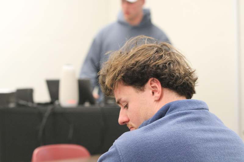 a man sitting in a room