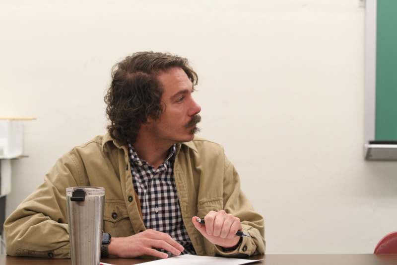 a man sitting at a table