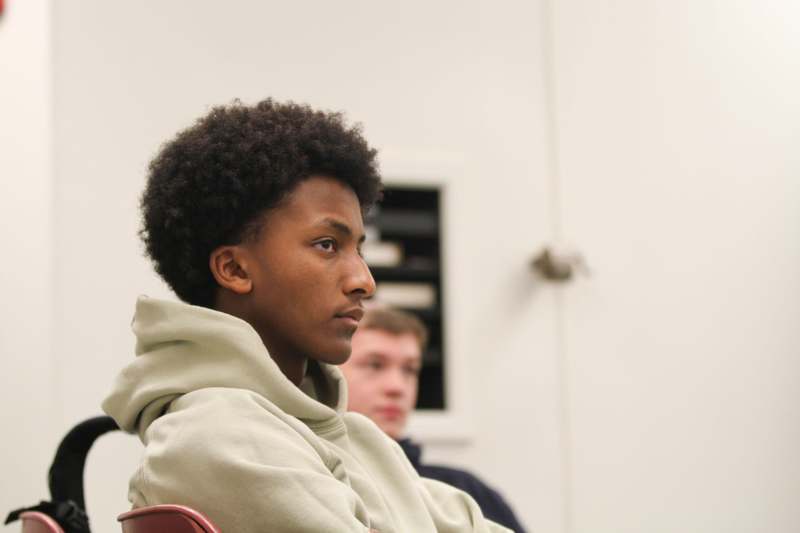 a man sitting in a chair