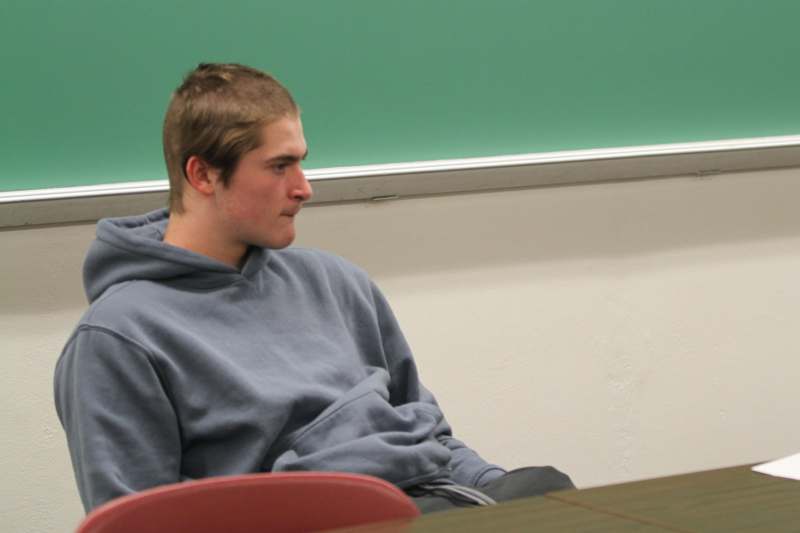 a man sitting in a chair