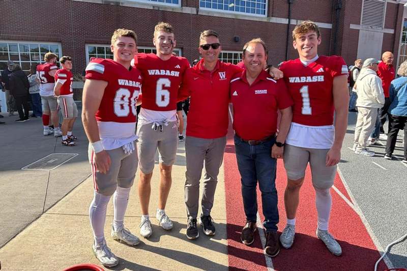 a group of men in football uniforms