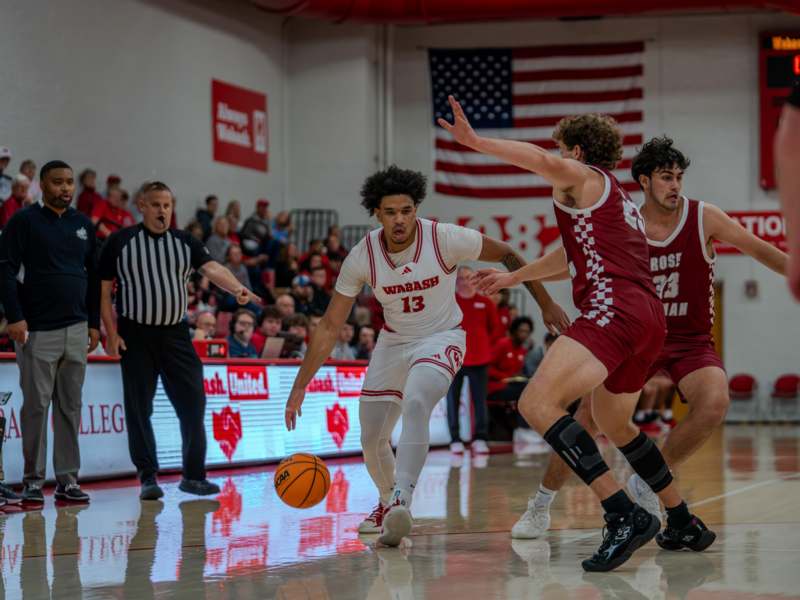 a group of men playing basketball