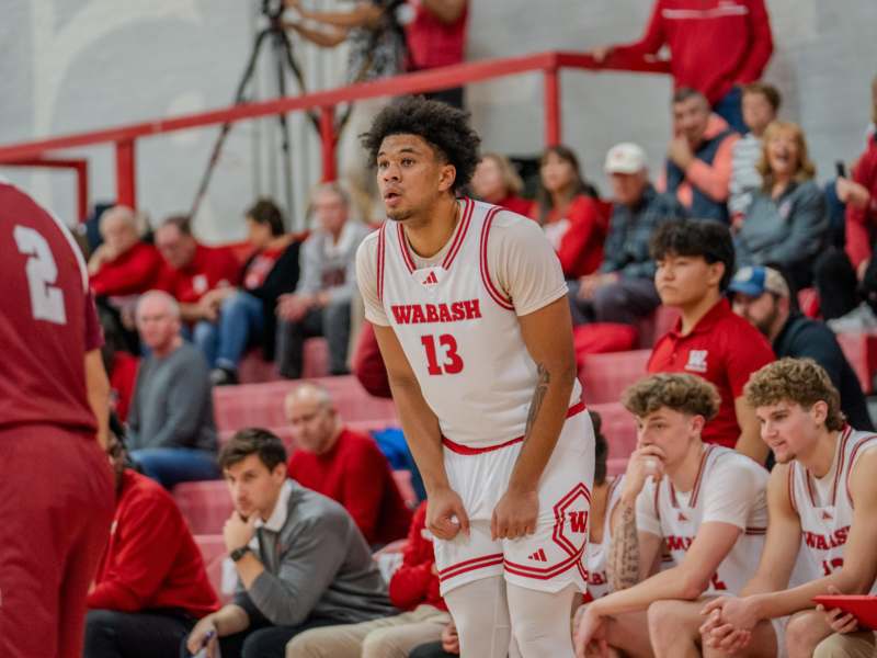 a basketball player in a red uniform