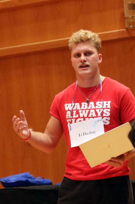 a man in a red shirt