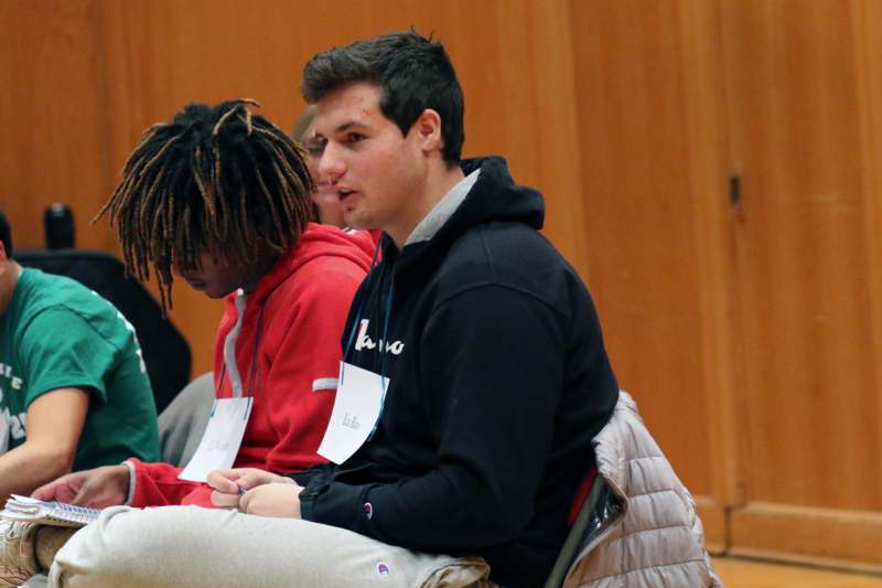 a group of people sitting in chairs