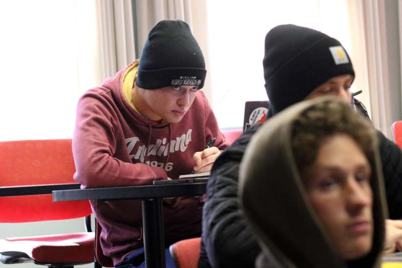 a group of people sitting at a table