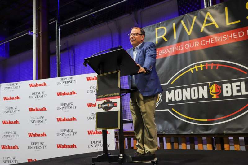 a man standing at a podium