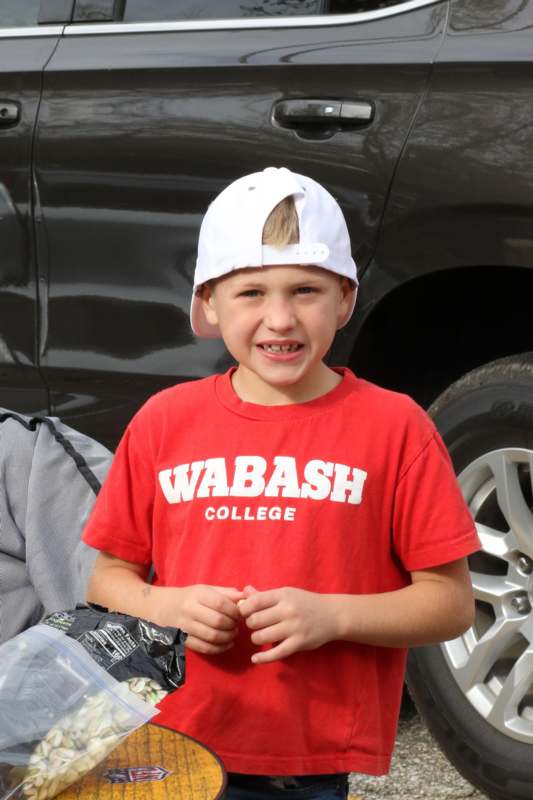 a boy in a red shirt