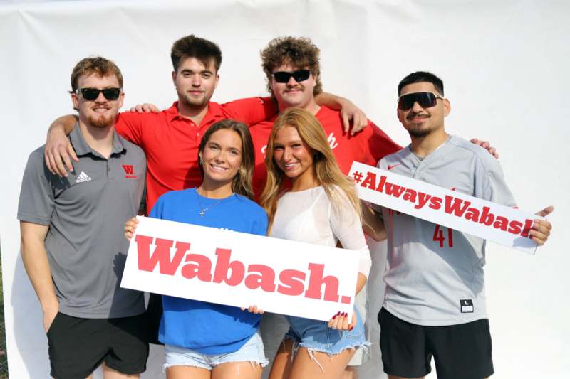 a group of people posing for a photo