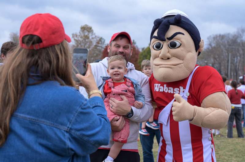 a person in a garment with a child