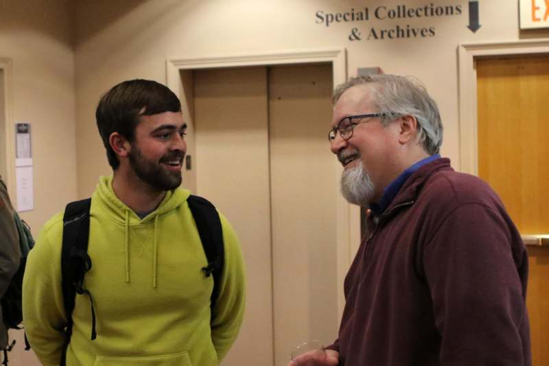 a man and a man smiling