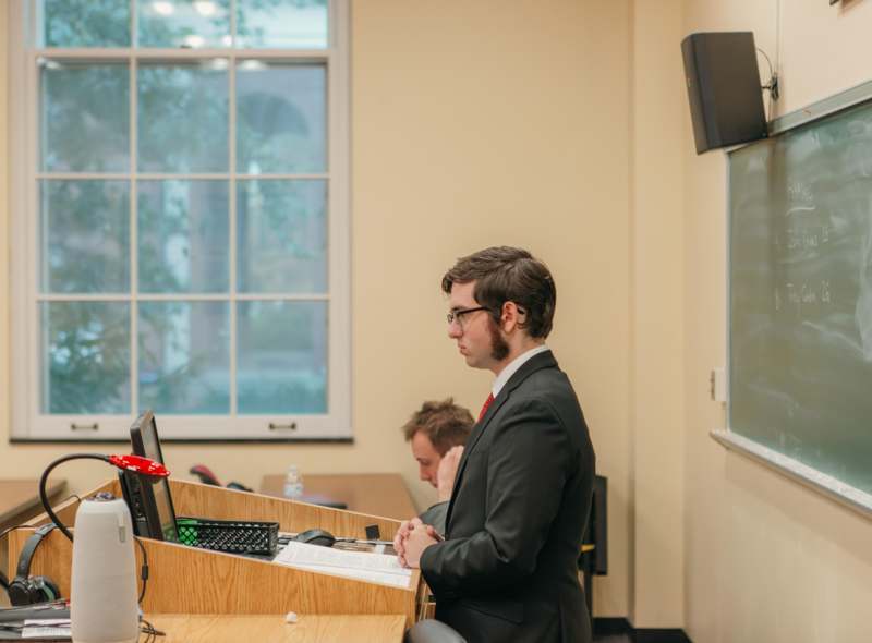 a man standing at a podium