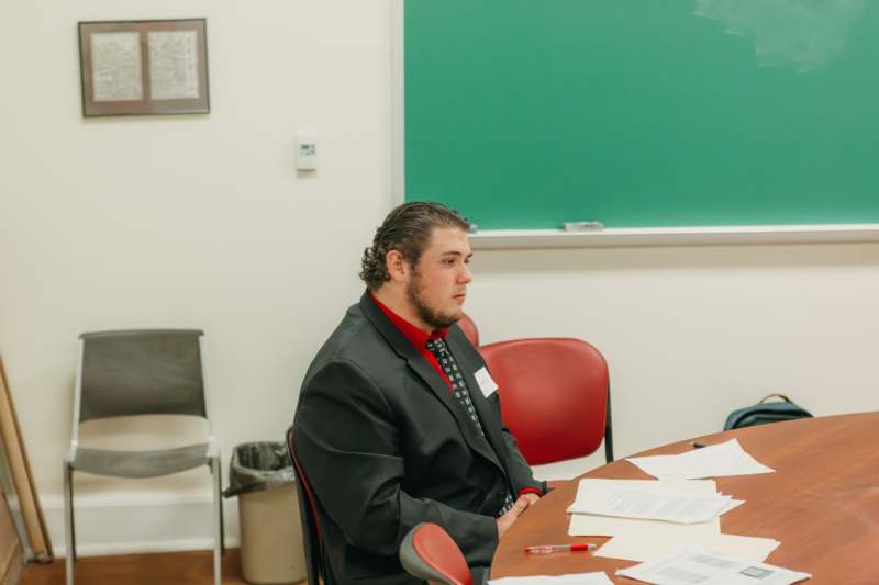 a man sitting at a table