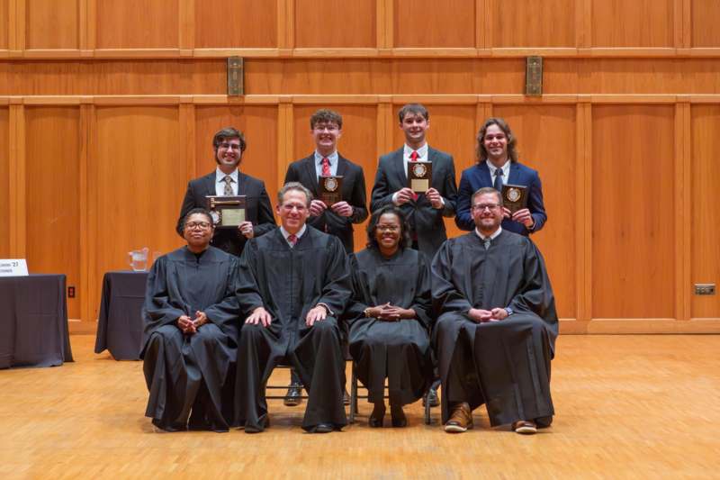 a group of people posing for a photo