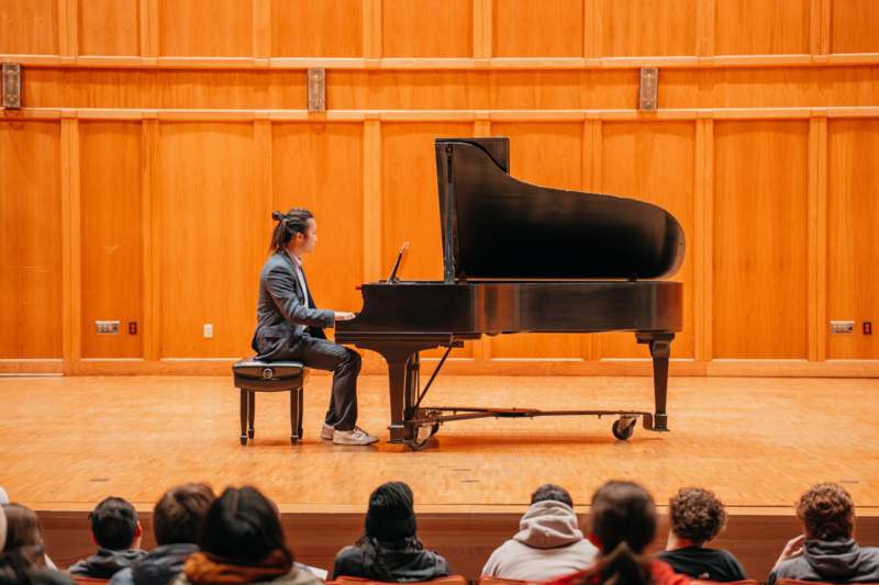a man playing a piano
