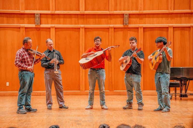 a group of people playing instruments