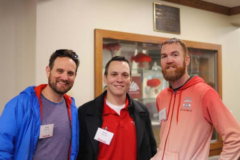 TKE Ribbon Cutting (11/01/25) - a group of men posing for a photo