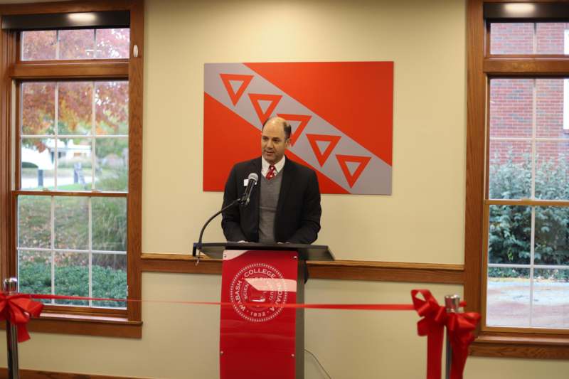 a man standing at a podium