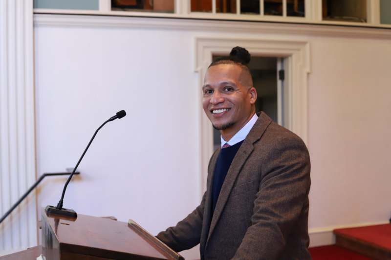 Founder's Day (11/06/25) - a man standing at a podium