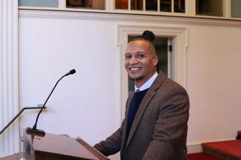 a man standing at a podium
