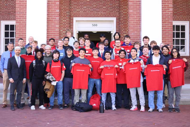 a group of people posing for a photo