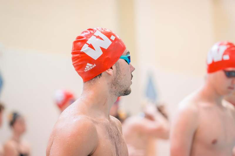 a man wearing a swim cap