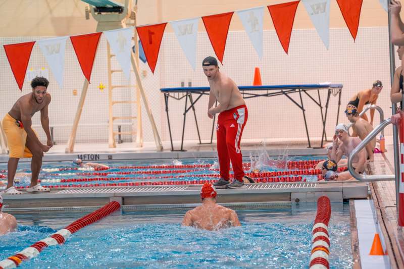 a group of people in a swimming pool