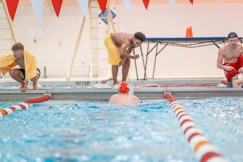 a group of people in a pool