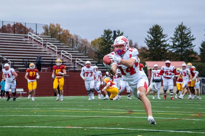 a football player running with a ball