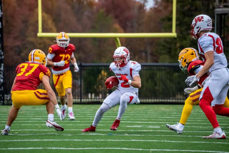 a group of people playing football