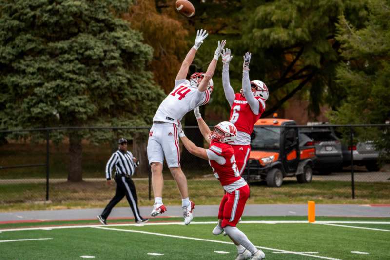 a group of people playing football