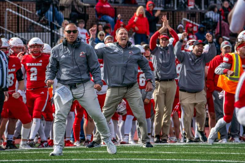 a group of men on a football field