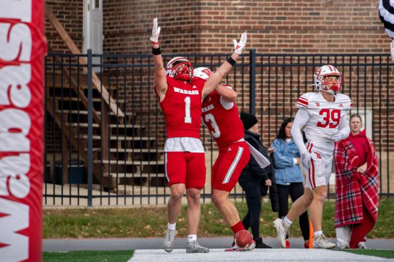 a group of football players celebrating