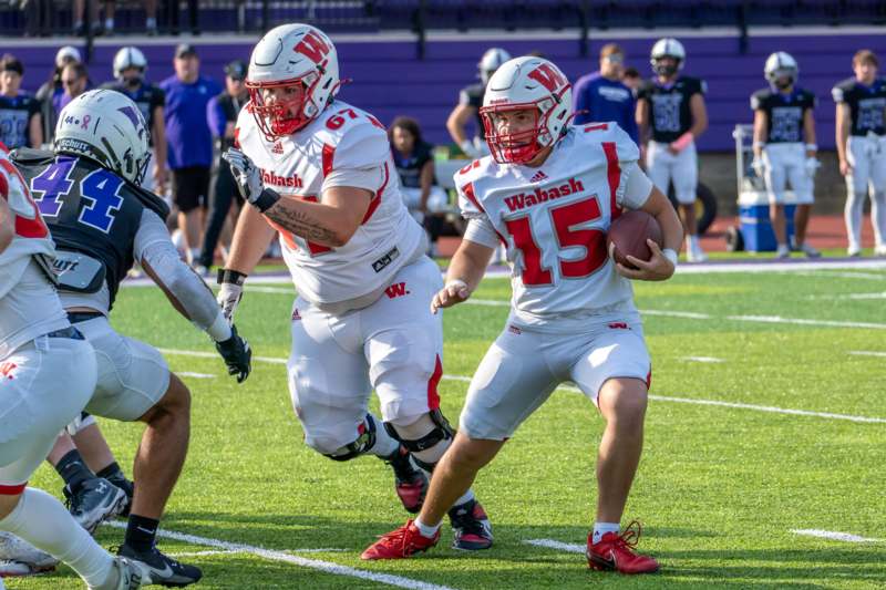 a group of men playing football