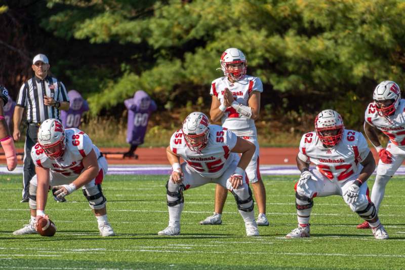 a group of football players on a field