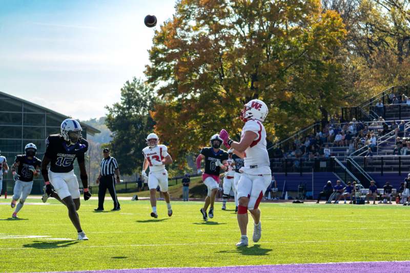a group of people playing football