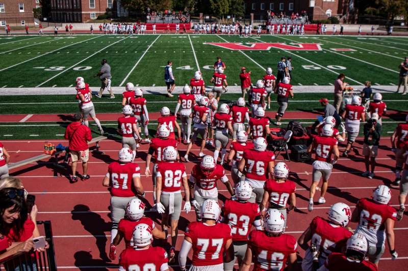 a group of football players on a football field