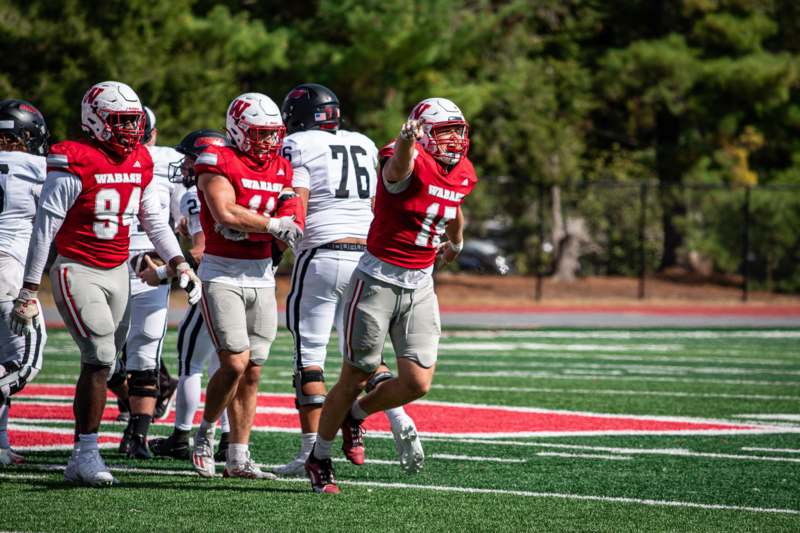a football player running on a field