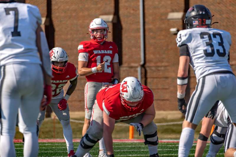 a football player in a red uniform
