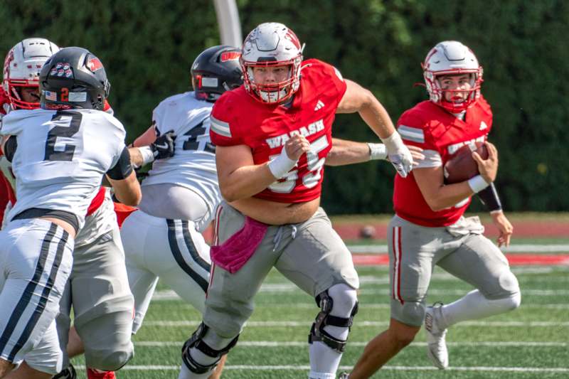 a group of football players on a field